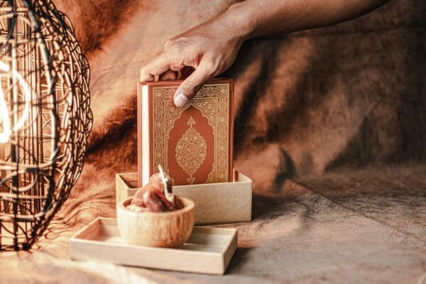 a person reaching for a box of food